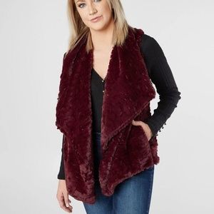 Excellent Burgandy women's faux fur vest. Large